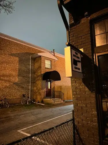 Alley secrets under the night sky.